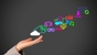 A woman's hand reaching up to a colorful cloud of social media icons.